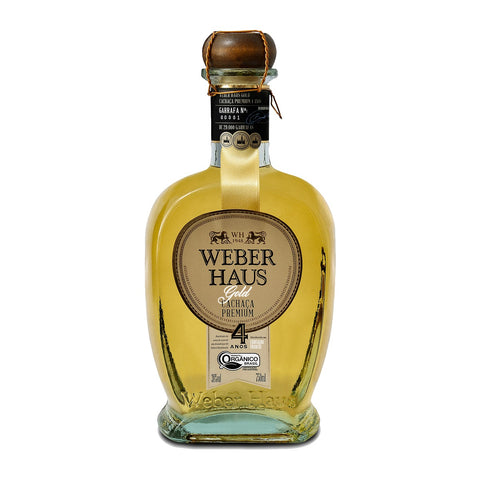 Garrafa de Cachaça Weber Haus Premium Gold 4 Anos 750ml, envelhecida em carvalho francês e amplamente premiada.